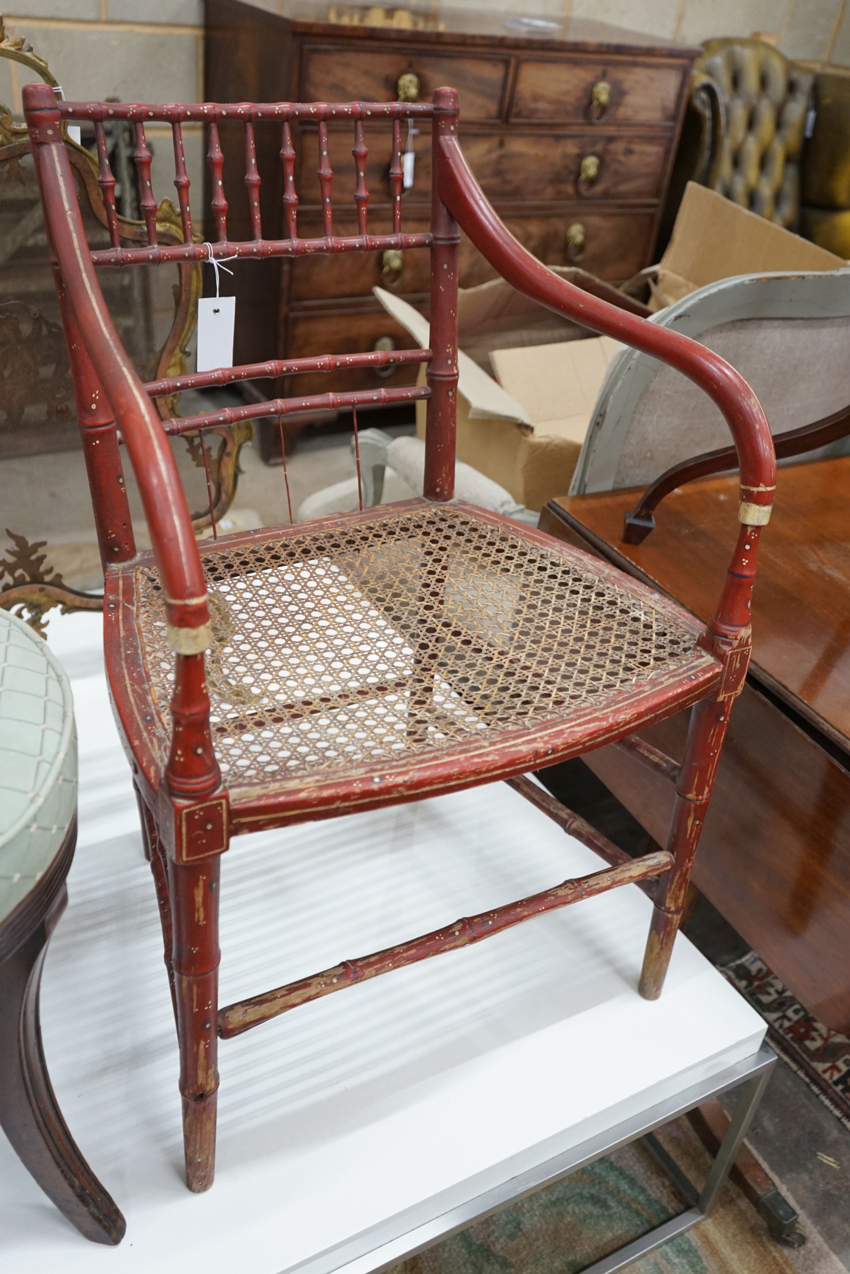 A Regency painted simulated bamboo cane seat elbow chair, width 54cm, depth 43cm, height 79cm